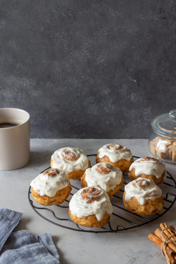 Sweet cinnamon buns with glaze. Pastries. Breakfast